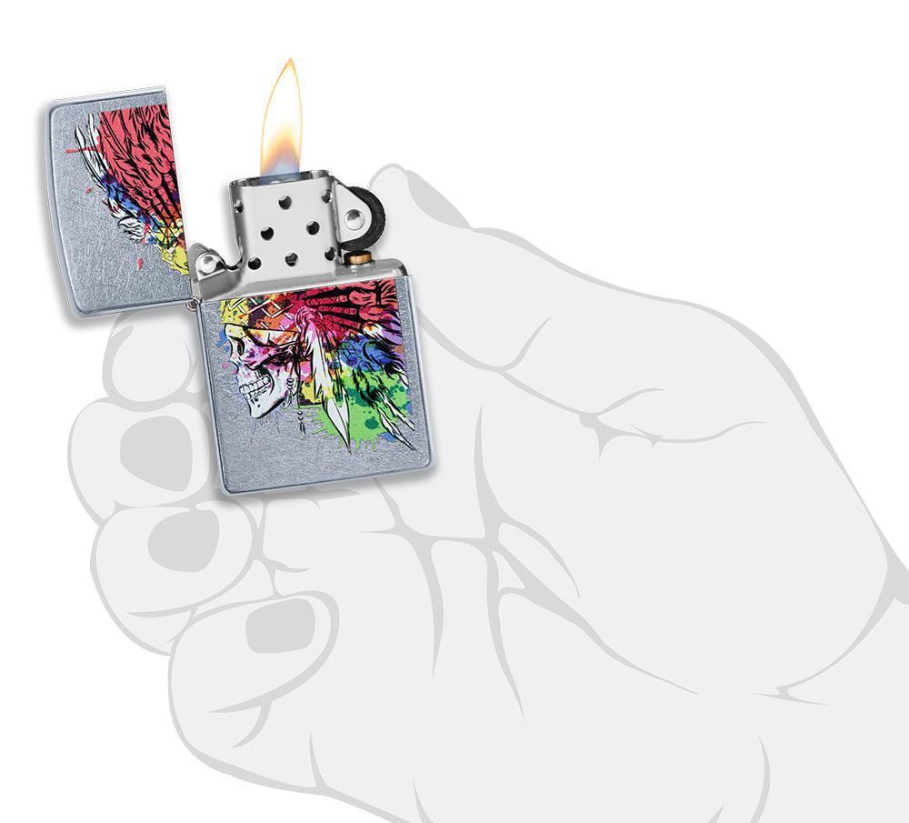 Skull with Headdress Design Street Chrome Windproof Lighter lit in hand