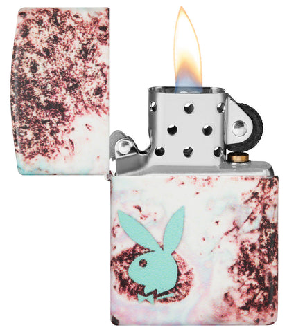 Zippo Feuerzeug mit bunter Farbpallette und mintfarbenen Playboy Hasenkopf geöffnet mit Flamme